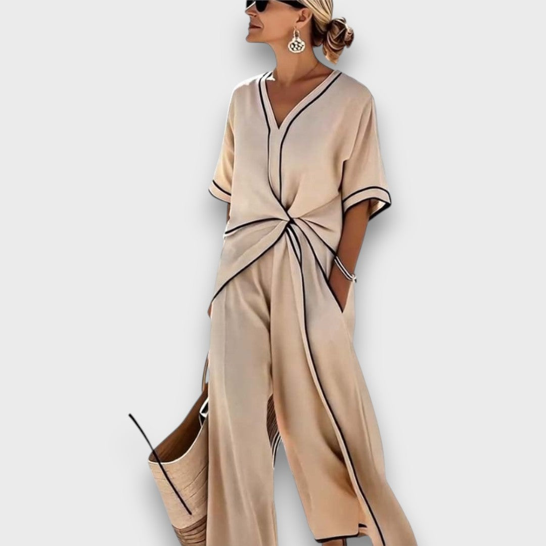 Marcellia – Elegant Jumpsuit with Contrast Piping